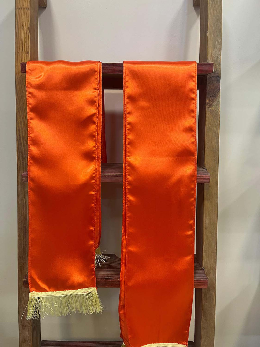 Divya India Orange plain unisex silk stole bring timeless elegance, making every wedding, anniversary, birthday, or celebration special by welcoming guests with warmth and grace - Divya India