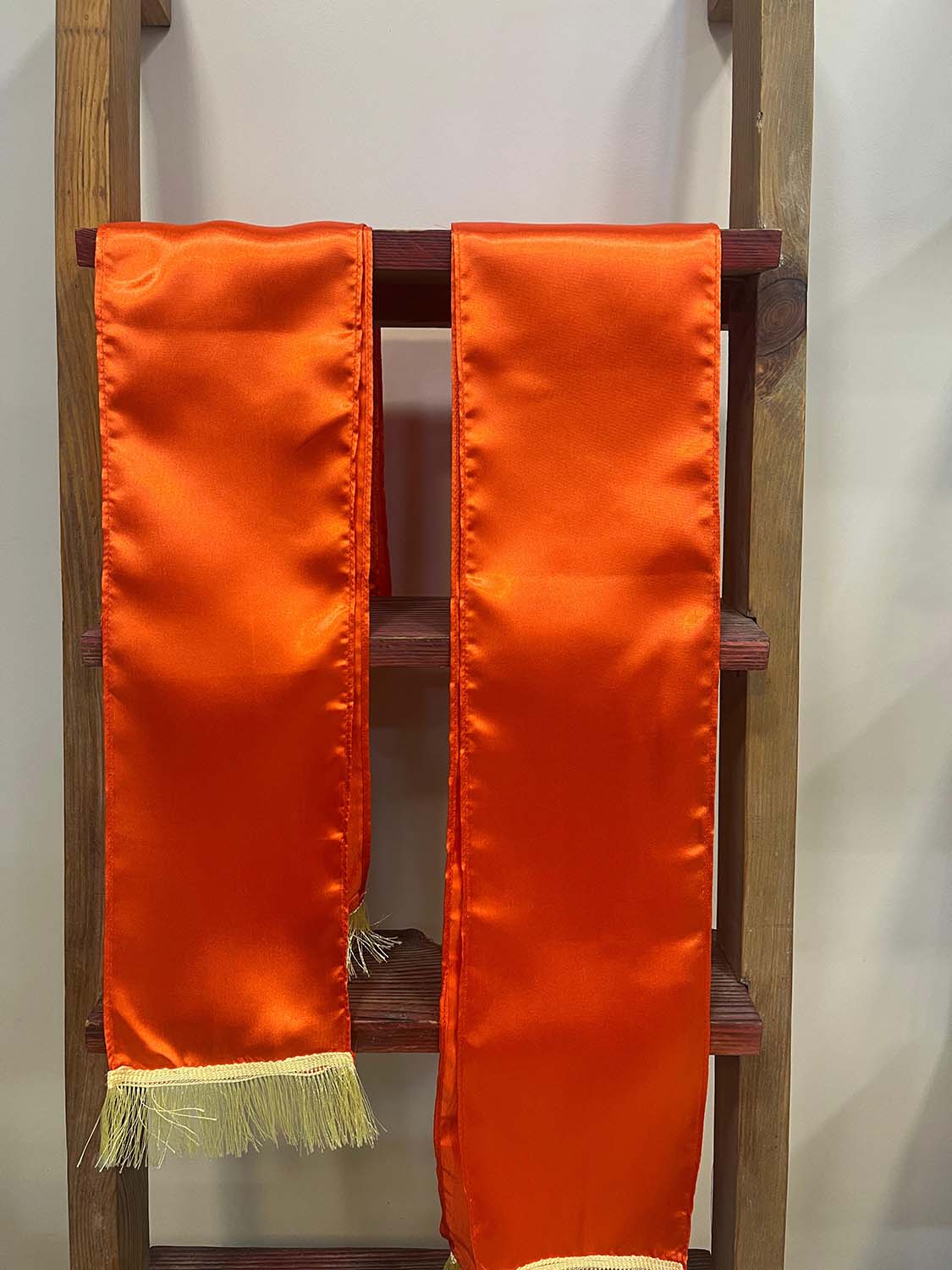 Divya India Orange plain unisex silk stole bring timeless elegance, making every wedding, anniversary, birthday, or celebration special by welcoming guests with warmth and grace - Divya India